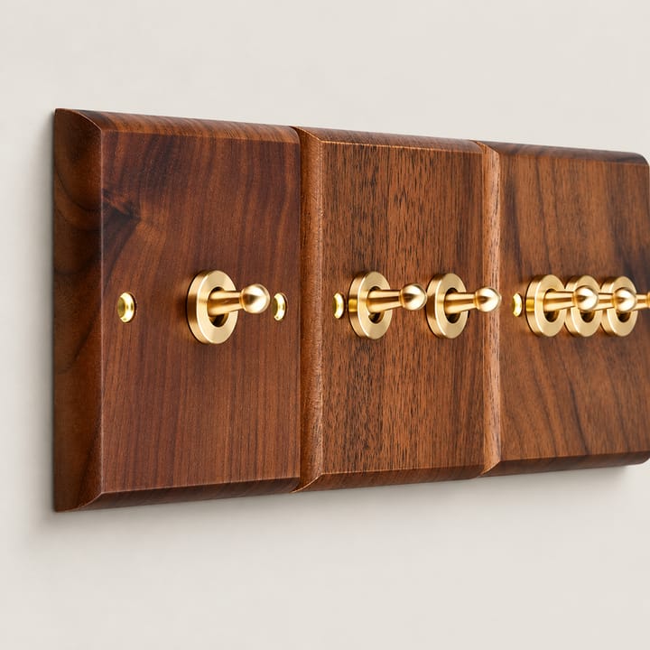 The Walnut and Brass Switch Plate