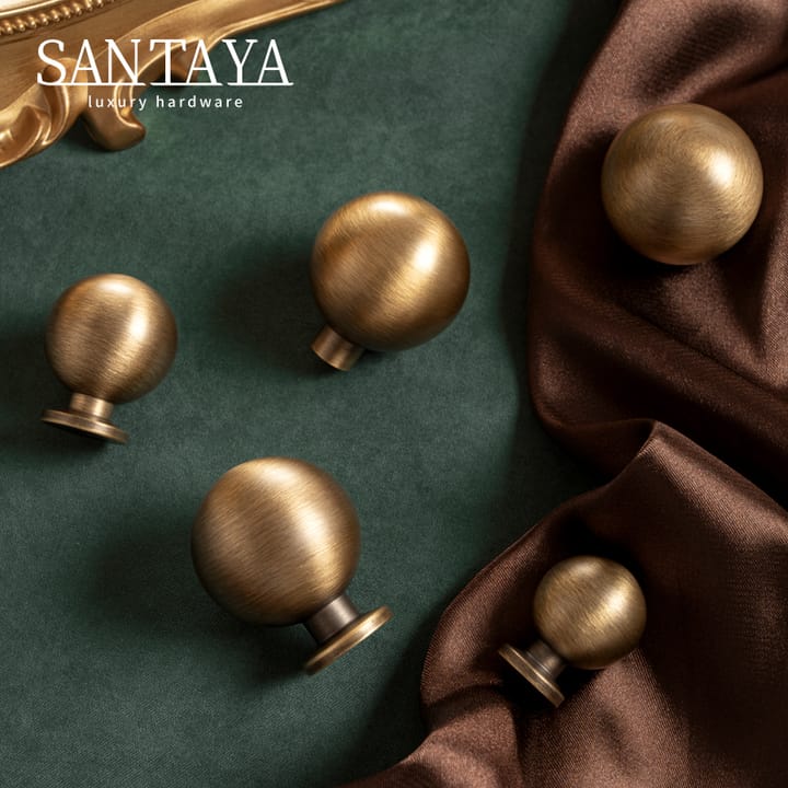 The Antique Bronze Round Brass Cabinet Knob