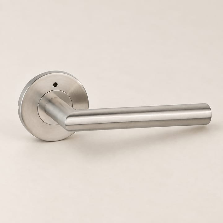 The Round Base Privacy Door Lever, Brushed steel