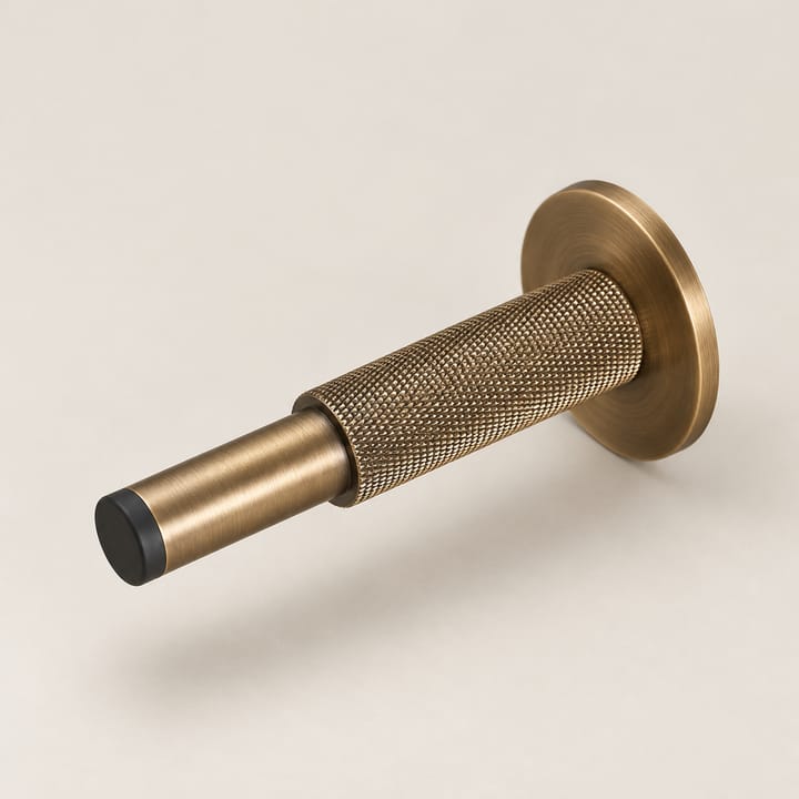 The Solid Brass Door Stop