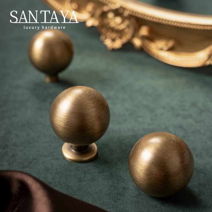 The Antique Bronze Round Brass Cabinet Knob